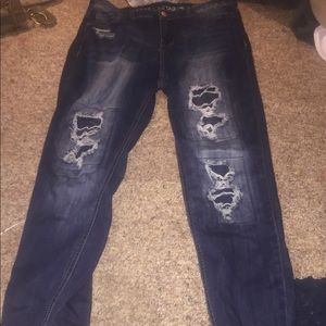 Distressed, mid rise skinny jeans size 13